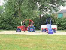 speeltoestel in de vorm van een tractor